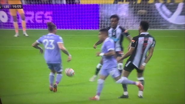 Joelinton has shorts practically pulled off as Newcastle fans rage at Mike Dean Leeds lost the ball in a dangerous position