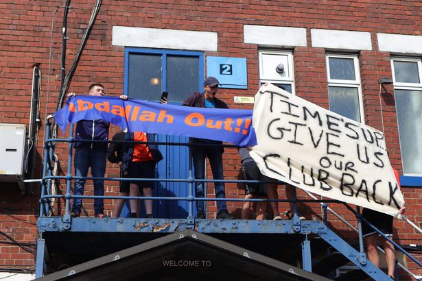 Oldham fans carry coffin and ‘call on grim reaper’ as protests vs owner get creative Fans protest outside the stadium against Oldham Athletic owner Abdallah Lemsagem prior to the Sky Bet League Two match between Oldham Athletic and Hartlepool United at Boundary Park on September 18, 2021 in Oldham, England.