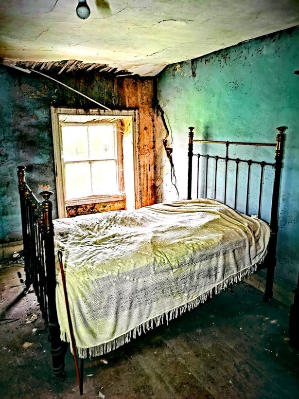 Old cottage 'frozen in time' abandoned by soldier whose dusty boots still lying on floor The bedroom is "frozen in time"