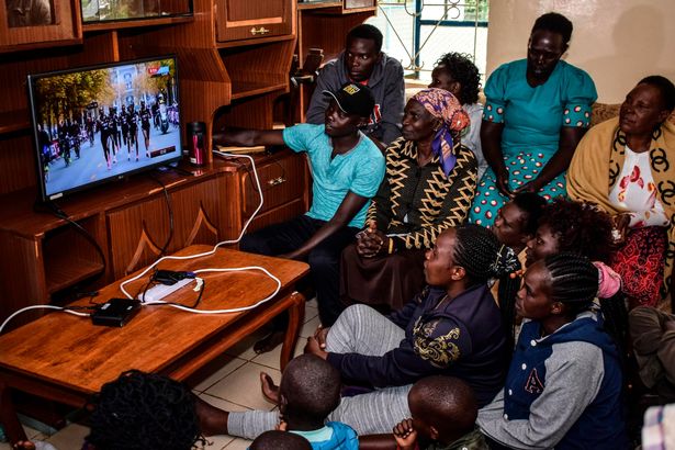 Netflix will soon be free for some Android users — there's just one catch World marathon record holder Eliud Kipchoge's mother, Janet Rotich (2L) watches a television broadcast on October 12, 2019, with relatives at her home in the village of Kapsisisywa, some 30kms southwest of Eldoret, in Kenya, as they celebrate Kenya's Eliud Kipchoge victory. - Kenya's Eliud Kipchoge, on October 12, 2019, made history, busting the mythical two-hour barrier for the marathon on a specially prepared course in a huge Vienna park. With an unofficial time of 1hr 59min 40.2sec, the Olympic champion became the first ever to run a marathon in under two hours in the Prater park with the course readied to make it as even as possible. (Photo by BRIAN ONGORO / AFP) (Photo by BRIAN ONGORO/AFP via Getty Images)