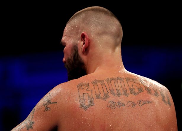 Meet tattooist behind Tony Bellew's 'Bomber' inking who wows celebs with body art A detailed view of Tony Bellew's back tattoo designed by Andy Cassidy