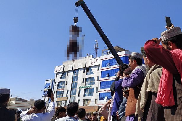 Taliban hangs bodies of four 'kidnappers' in street as brutal 'warning' to criminals Taliban execution