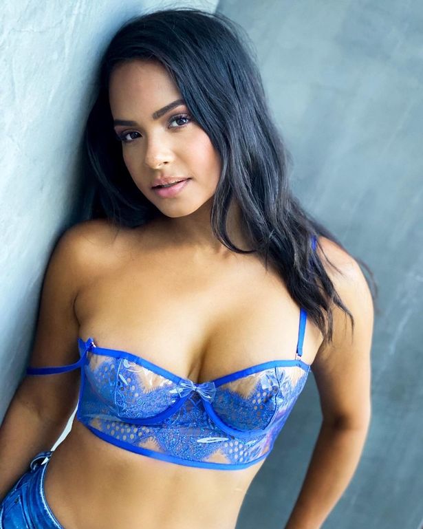 Christina Milian's hottest snaps as she turns 40 – teeny bikinis to curves for days Looking beautiful in blue in a barely-there-bra