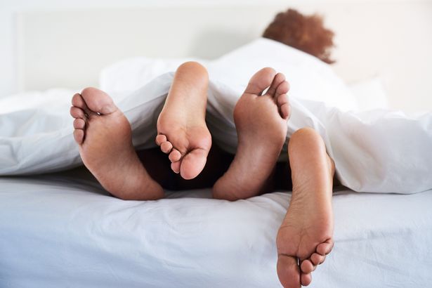 Top 10 sex fetishes popular among couples right now – from bondage to role play Couple's feet poking out of the bed