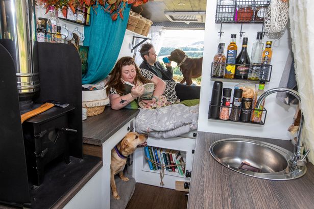 Couple sell ‘dream’ 12-room house to live in campervan with dogs Victoria and Scott with their converted van and two dogs
