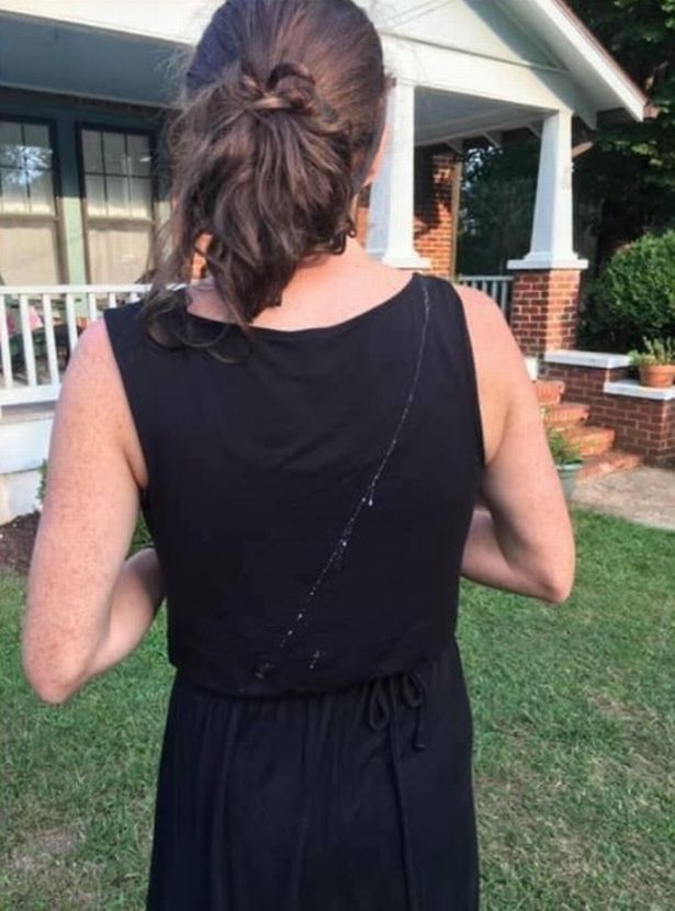 Husband compliments his wife’s pretty ‘dress design’ before putting his foot in it woman in black dress turned from camera
