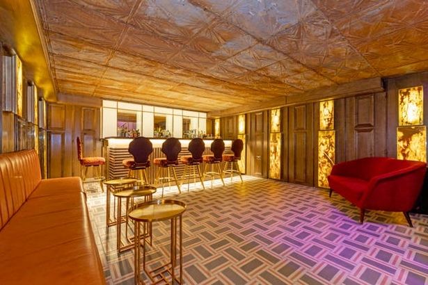 Popstar's breathtaking £1.9m mansion for sale – complete with all-gold bar in basement