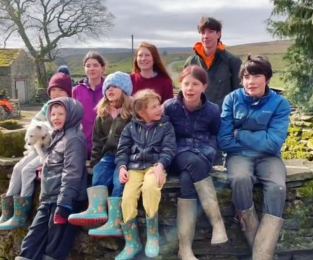 Our Yorkshire Farm Amanda Owen hits back as trolls says kids 'won't cope in real world' Image of AMANDA OWEN and her family - nine children and husband clive from Our Yorkshire Farm