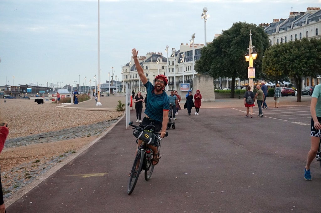 Record-breaking cyclists complete their ‘refugees welcome’ ride