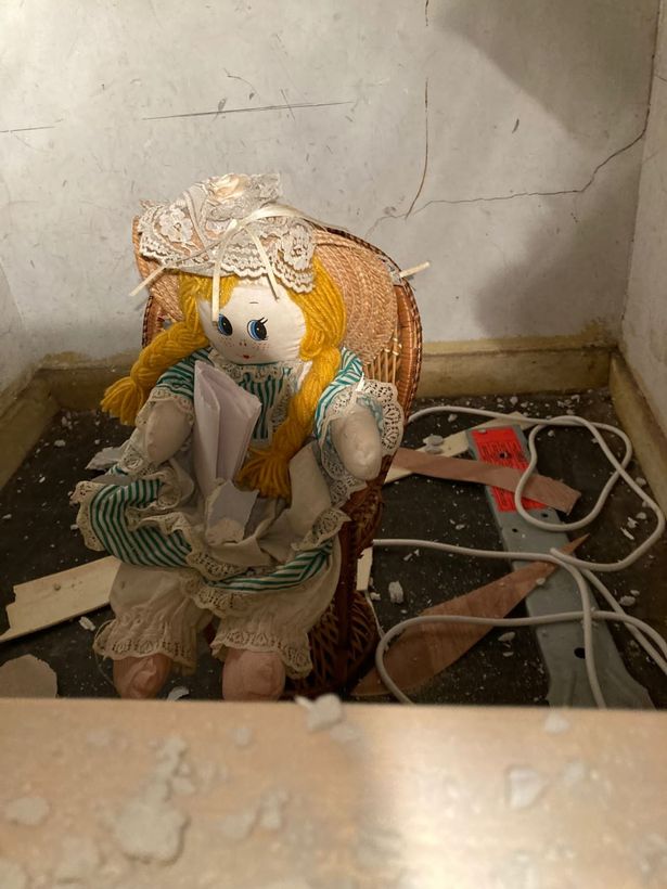 Teacher told to move out as creepy doll 'who killed owners' found sealed in wall The doll apparently stabbed its original owners to death