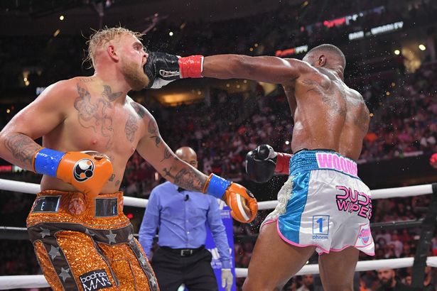 Tyron Woodley ready to get embarrassing Jake Paul tattoo to secure rematch Tyron Woodley punches Jake Paul in their cruiserweight bout during a Showtime pay-per-view event at Rocket Morgage Fieldhouse on August 29, 2021 in Cleveland, Ohi